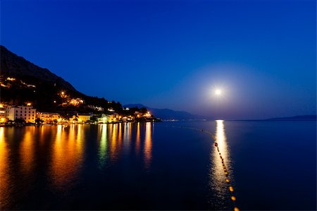 rooftop cityscape night - Small Dalmatian Village and Adriatic Sea Bay Illuminated by Moon, Croatia Stock Photo - Budget Royalty-Free & Subscription, Code: 400-06457351