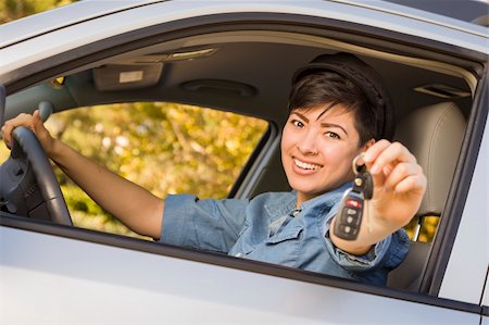 drivers licence - Happy Smiling Mixed Race Woman in Car Holding Set of Keys. Stock Photo - Budget Royalty-Free & Subscription, Code: 400-06457958