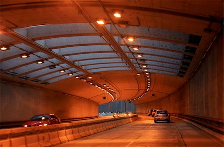 simsearch:400-06481952,k - Cars head for the light at the end of the tunnel. San Francisco Stock Photo - Budget Royalty-Free & Subscription, Code: 400-06458288