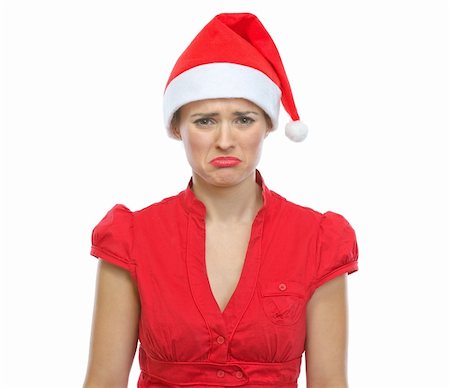 Portrait of sad young woman in Santa hat Stock Photo - Budget Royalty-Free & Subscription, Code: 400-06458875