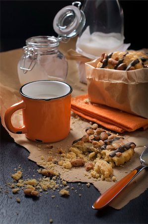 simsearch:400-06462101,k - Close-up of a broken peanut cookies with chocolate and a mug of milk, shot in dark tones. Stock Photo - Budget Royalty-Free & Subscription, Code: 400-06459530