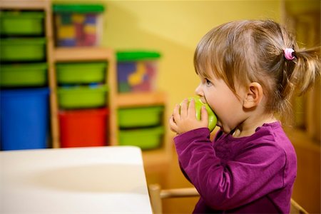 photos kids eating daycare - Happy children and healthy food, baby girl eating fruit at school Stock Photo - Budget Royalty-Free & Subscription, Code: 400-06459856