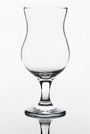 simsearch:400-06914465,k - Single empty wineglass on a white background Fotografie stock - Microstock e Abbonamento, Codice: 400-06459998