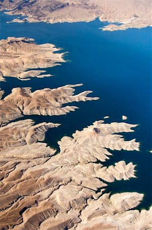 Aerial view of the Colorado River and Lake Mead, a snapshot taken from a helicopter on the border of Arizona and Nevada, USA Foto de stock - Super Valor sin royalties y Suscripción, Código: 400-06460166