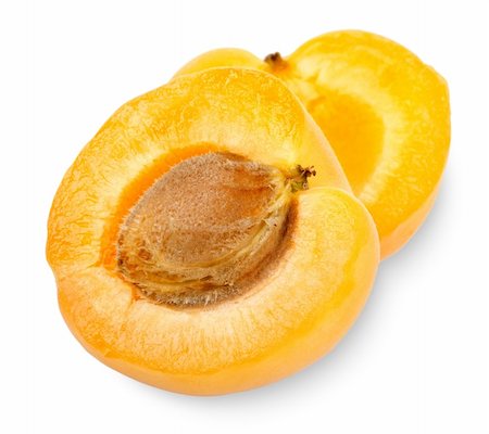 simsearch:400-05265200,k - Ripe apricot sectioned by knife on white background Photographie de stock - Aubaine LD & Abonnement, Code: 400-06460463