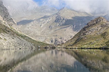Alpine lake close to the path to the top of Monviso mountain, one of the most scenic mountain of Alps Stock Photo - Budget Royalty-Free & Subscription, Code: 400-06460582