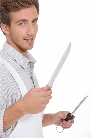 Butcher holding knifes Stock Photo - Budget Royalty-Free & Subscription, Code: 400-06461202