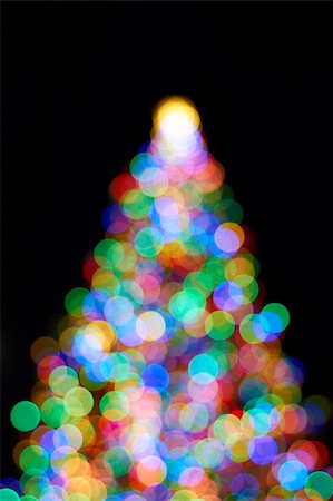 Christmas Tree with Colorful Out of Focus Blurred Light on Black Background Stock Photo - Budget Royalty-Free & Subscription, Code: 400-06461961