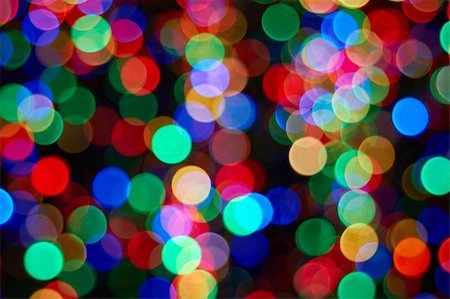 Christmas Tree with Colorful Out of Focus Blurred Light on Black Background Closeup Stock Photo - Budget Royalty-Free & Subscription, Code: 400-06461962