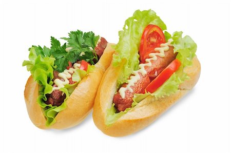 simsearch:400-04290264,k - Two tasty and delicious hotdog. Isolated on white. Stockbilder - Microstock & Abonnement, Bildnummer: 400-06462106