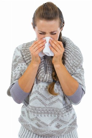 sneeze in her handkerchief - Woman having running nose and using napkin Stock Photo - Budget Royalty-Free & Subscription, Code: 400-06462424