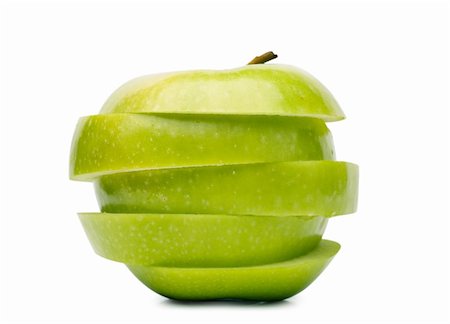 smith - Big green sliced apple isolated over white background Photographie de stock - Aubaine LD & Abonnement, Code: 400-06463107