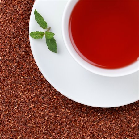 simsearch:400-06554630,k - Rooibos Tea in a cup with copy space, served with a balm Stock Photo - Budget Royalty-Free & Subscription, Code: 400-06463465