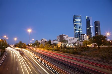 quintanilla (artist) - evening at highway next to skyscrapers in Madrid city Spain Photographie de stock - Aubaine LD & Abonnement, Code: 400-06475703