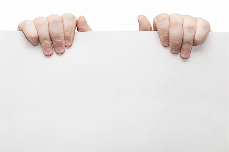 The two hands holding light grey cardboard paper Stock Photo - Budget Royalty-Free & Subscription, Code: 400-06475724