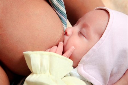 simsearch:400-05382792,k - Little baby girl breast feeding Fotografie stock - Microstock e Abbonamento, Codice: 400-06477008