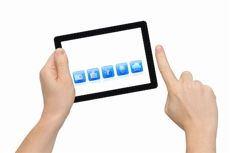 Two hands holding tablet PC, finger pointing, isolated on white, clipping path Stock Photo - Budget Royalty-Free & Subscription, Code: 400-06477939