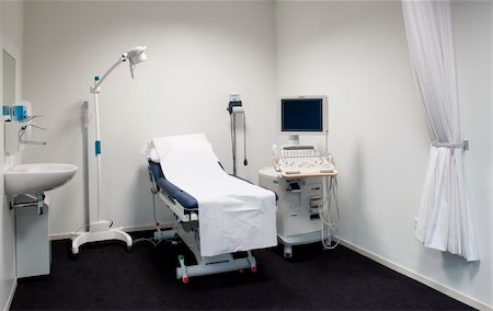 pregnant scan - ultrasound exam room Foto de stock - Super Valor sin royalties y Suscripción, Código: 400-06478237