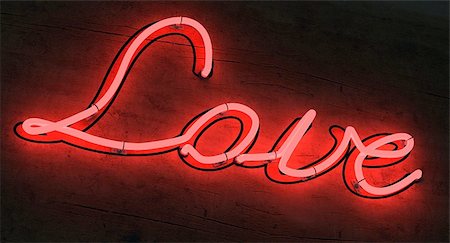 The letters LOVE lighted up in red neon colors Stock Photo - Budget Royalty-Free & Subscription, Code: 400-06478887
