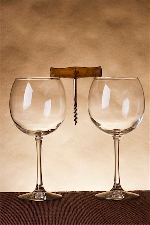 Two empty glasses and a corkscrew between. Photographie de stock - Aubaine LD & Abonnement, Code: 400-06479038