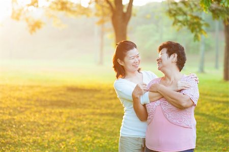 family healthy candid - Happy Asian senior mother with her daughter at outdoor park Stock Photo - Budget Royalty-Free & Subscription, Code: 400-06479234
