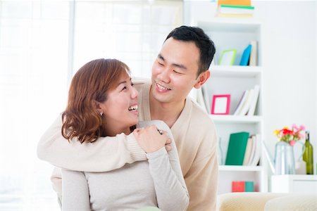 Happy Asian couple lifestyle, indoor home Stock Photo - Budget Royalty-Free & Subscription, Code: 400-06479266
