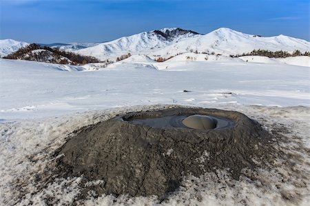 Mud Volcanoes in winter. Location: Buzau Romania Foto de stock - Royalty-Free Super Valor e Assinatura, Número: 400-06479367