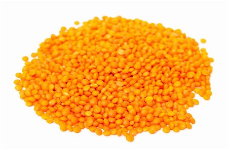 Heap of orange lentil, isolated on white background Stock Photo - Budget Royalty-Free & Subscription, Code: 400-06479585