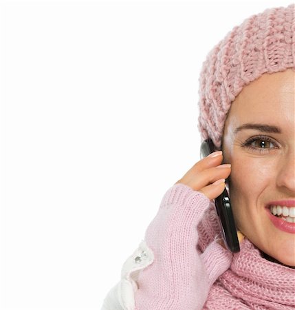 simsearch:400-04596625,k - Closeup on happy woman in knit winter clothing speaking mobile Stock Photo - Budget Royalty-Free & Subscription, Code: 400-06484472