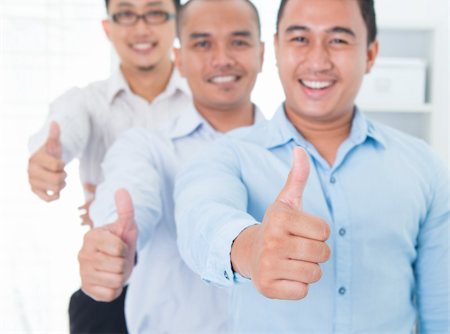 Thumbs up Southeast Asian business group standing in office Stock Photo - Budget Royalty-Free & Subscription, Code: 400-06484569
