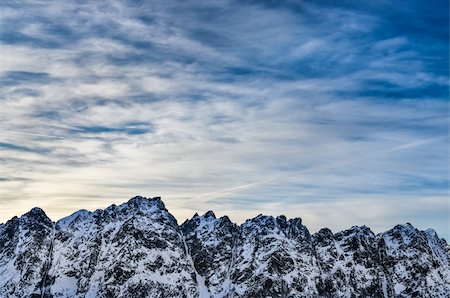 simsearch:400-05038432,k - Winter mountains landscape with blue cloudy sky Stock Photo - Budget Royalty-Free & Subscription, Code: 400-06485078