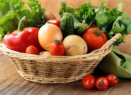 fresh vegetables and herbs mix in a wicker basket Stock Photo - Budget Royalty-Free & Subscription, Code: 400-06485485