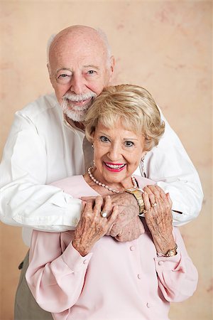 simsearch:400-04065020,k - Beautiful senior couple in love, posing for a portrait in a close embrace. Foto de stock - Royalty-Free Super Valor e Assinatura, Número: 400-06485543
