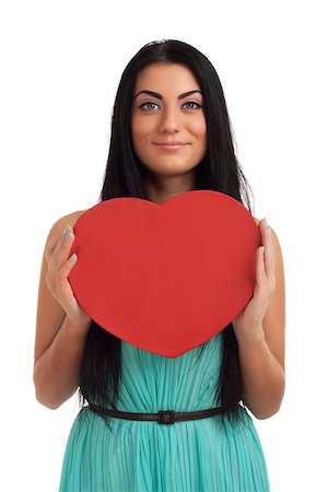 Woman holding Valentines Day heart sign. Isolated over white background Stock Photo - Budget Royalty-Free & Subscription, Code: 400-06485644