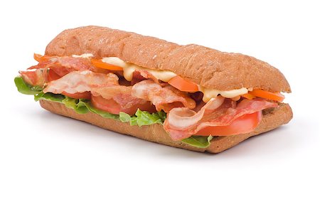 Big Ciabatta Sandwich with Bacon, Lettuce, Tomato, Cheese and Sauces isolated on white background Fotografie stock - Microstock e Abbonamento, Codice: 400-06485806