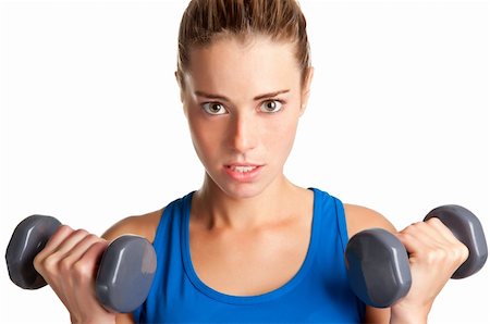 pic of girls with biceps - Woman working out with dumbbells at a gym Stock Photo - Budget Royalty-Free & Subscription, Code: 400-06480028