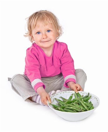 simsearch:400-06480358,k - small girl with grean peas on white background Foto de stock - Super Valor sin royalties y Suscripción, Código: 400-06480359