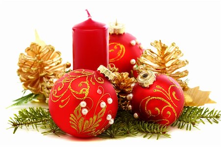 Christmas red balls, candle and pine cones on a white background. Stock Photo - Budget Royalty-Free & Subscription, Code: 400-06480409