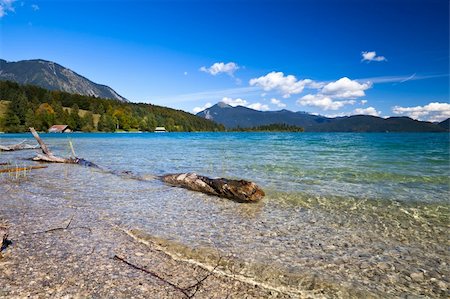 beautiful transparemt blue alpine lake Walchensee, Bavaria Foto de stock - Super Valor sin royalties y Suscripción, Código: 400-06481080