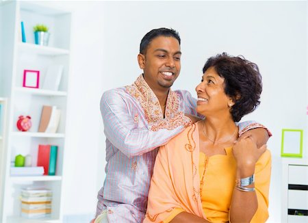 Asian Indian family, adult son having conversation with senior mother indoor. Stock Photo - Budget Royalty-Free & Subscription, Code: 400-06481493