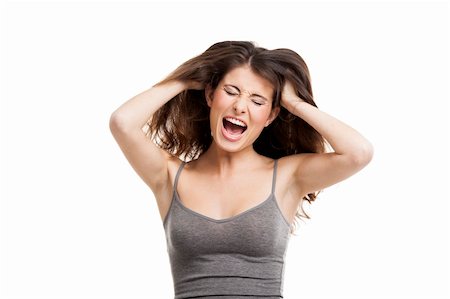 person screaming pulling hair - Portrait of a young woman yelling really loud, isolated on white Stock Photo - Budget Royalty-Free & Subscription, Code: 400-06481640