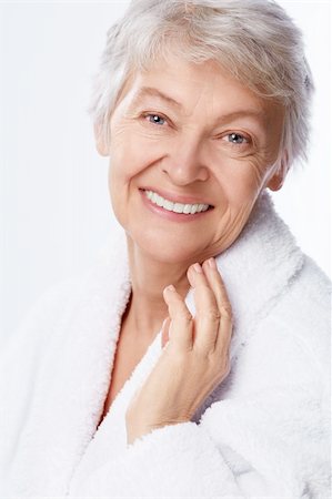 simsearch:400-06482471,k - Elderly woman in a bathrobe on a white background Stock Photo - Budget Royalty-Free & Subscription, Code: 400-06482477