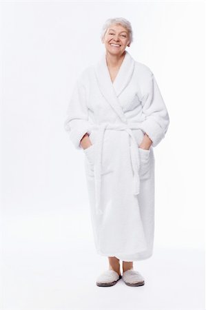 simsearch:400-06482471,k - Elderly woman in a bathrobe on a white background Stock Photo - Budget Royalty-Free & Subscription, Code: 400-06482478