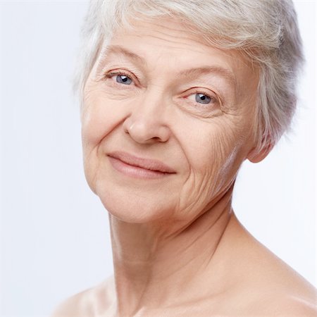 simsearch:400-06482471,k - Elderly woman on a white background Stock Photo - Budget Royalty-Free & Subscription, Code: 400-06482472