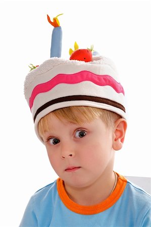 rosy cheeks - Little Boy in Funny Hat Surprised closeup on white background Stock Photo - Budget Royalty-Free & Subscription, Code: 400-06482909