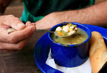 soup and crackers - Vegetable soup in a dark blue cup Stock Photo - Budget Royalty-Free & Subscription, Code: 400-06483209