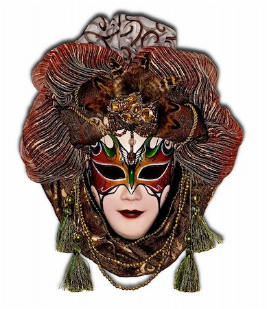 Carnival mask decorated with beads, feathers and fabric, is shown in white. Stock Photo - Budget Royalty-Free & Subscription, Code: 400-06483413