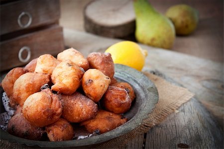 deep fry - Bowl of Deep fried fritters donuts in rustic country setting Stock Photo - Budget Royalty-Free & Subscription, Code: 400-06514186