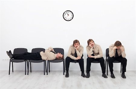 Bored, stressed and exhausted people sitting on chairs waiting Stock Photo - Budget Royalty-Free & Subscription, Code: 400-06515167