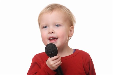 Young toddler with microphone on white background Stock Photo - Budget Royalty-Free & Subscription, Code: 400-06517477